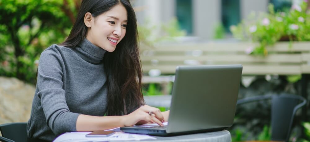 Man and woman using computer